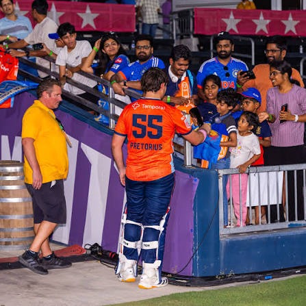 Pretorius greeting fans at the boundary after his innings